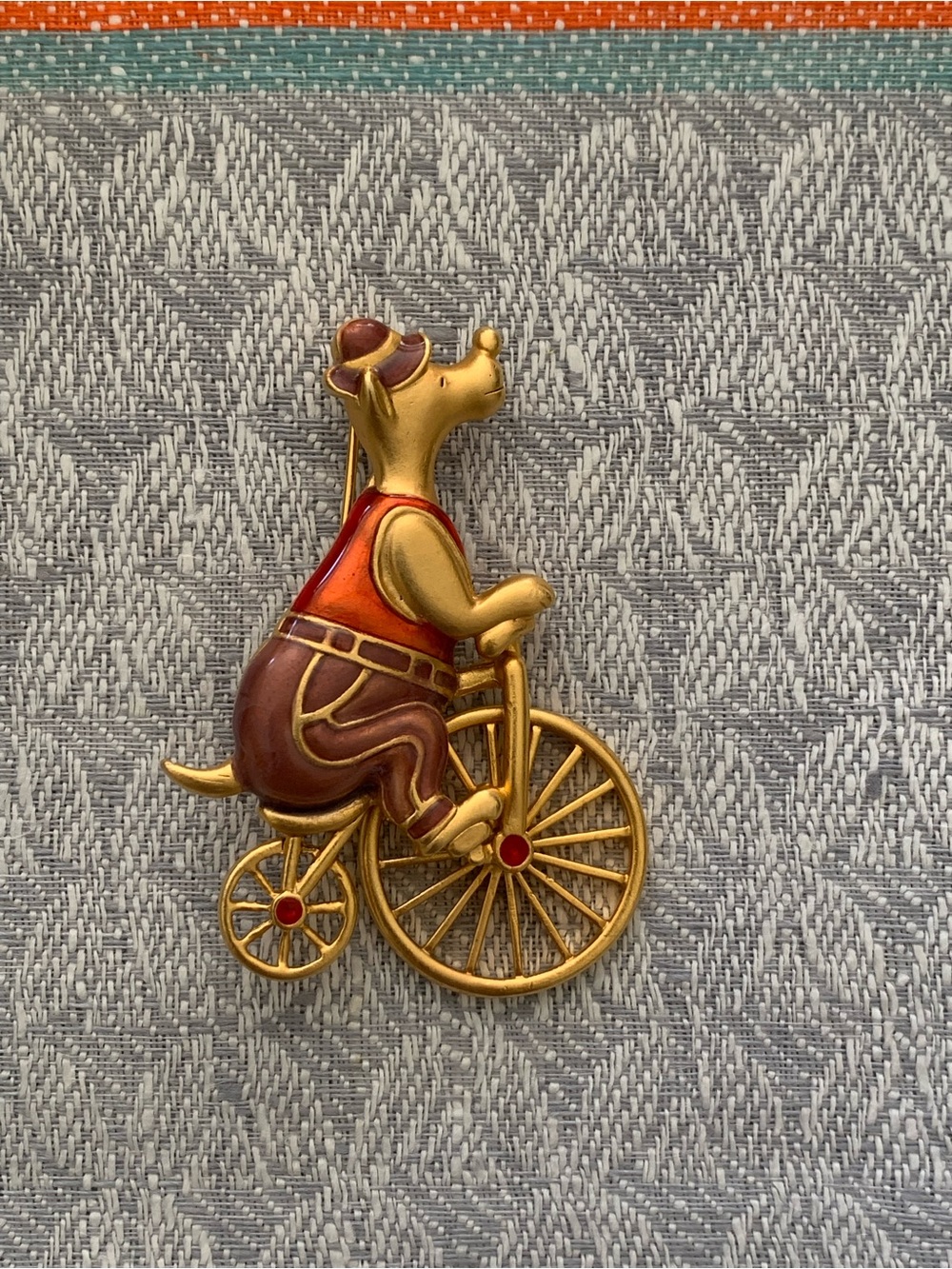 Vintage DANECRAFT Gold-Tone Red & Brown Bear on Bicycle with Moving Wheel Brooch